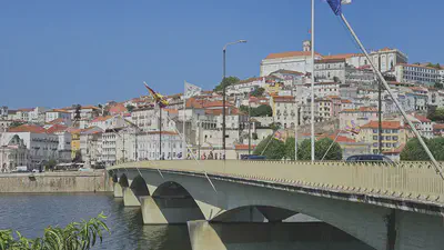 Coimbra on the Mondego, host city of ELMI 2026.